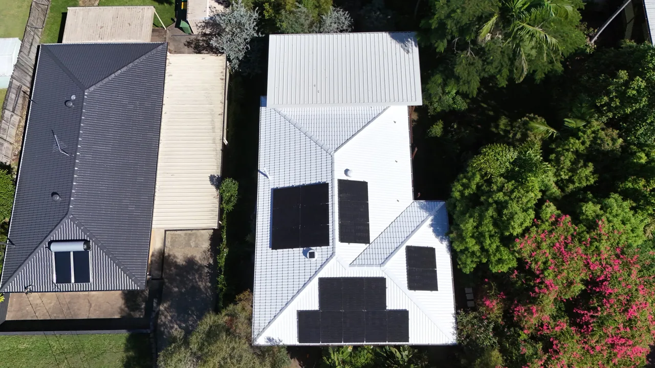 Freshly repainted white metal roof on a Brisbane home